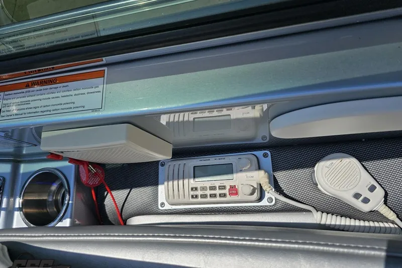 Slide: The Image of 2012 Formula 353 FASTech boat dashboard with radio and warning label. - 70