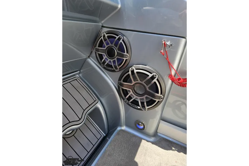Slide: The Image of 2012 Formula 353 FASTech boat interior with JL Audio speakers and safety lanyard. - 71