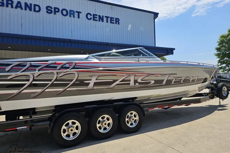 Slide: The Image of 2012 Formula 353 FASTech boat on trailer at Grand Sport Center. - 9