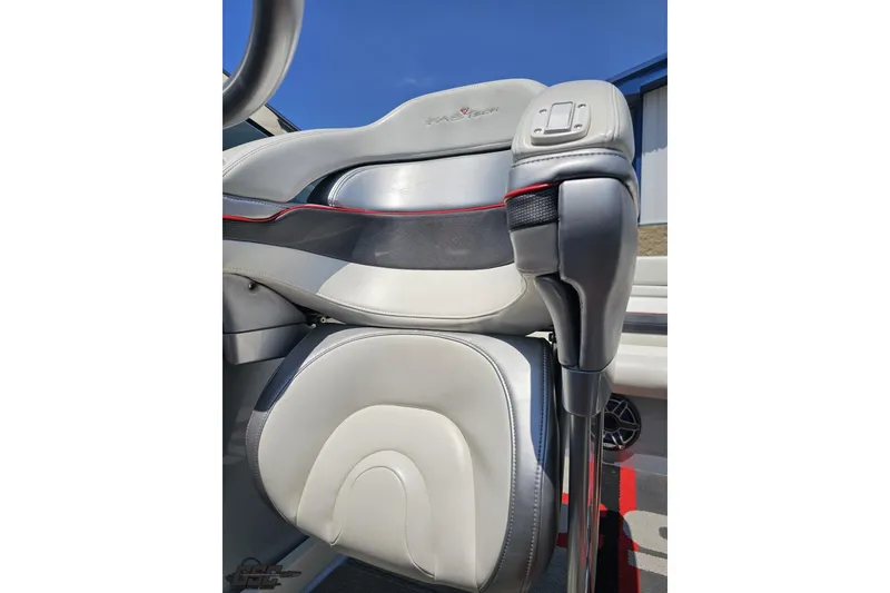 Slide: The Image of 2012 Formula 353 FASTech boat interior with sleek, modern seat design and control panel. - 98
