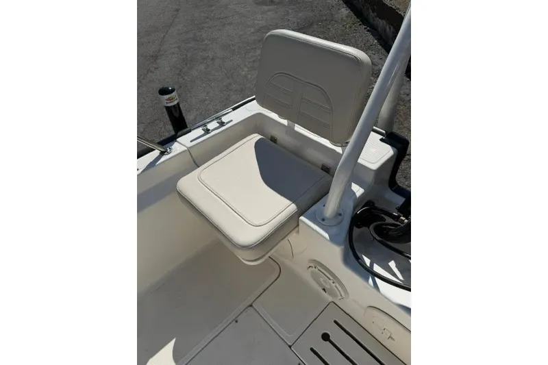 Slide: The Image of 2021 Boston Whaler 170 Montauk boat seat, featuring white cushioned upholstery. - 18