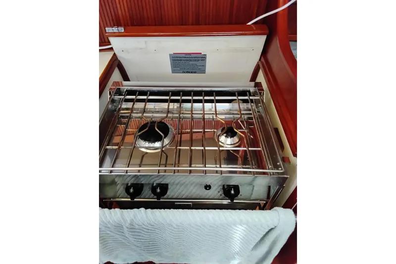 Slide: The Image of Stainless steel stove in 1986 Sabre 38 yacht galley, featuring two burners. - 12