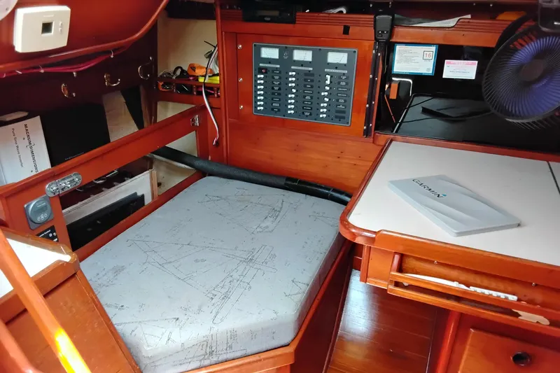 Slide: The Image of Interior of a 1986 Sabre 38 sailboat with navigation equipment and control panel. - 16