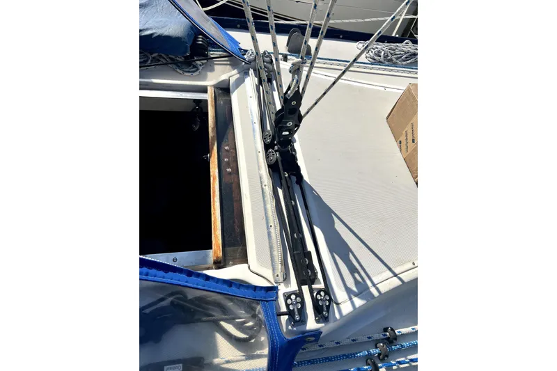 Slide: The Image of 1986 Sabre 38 sailboat deck with rigging and open hatch. - 4