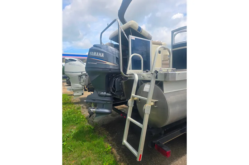 Slide: The Image of 2009 Bennington 2275SL pontoon boat with Yamaha outboard motor and boarding ladder. - 3
