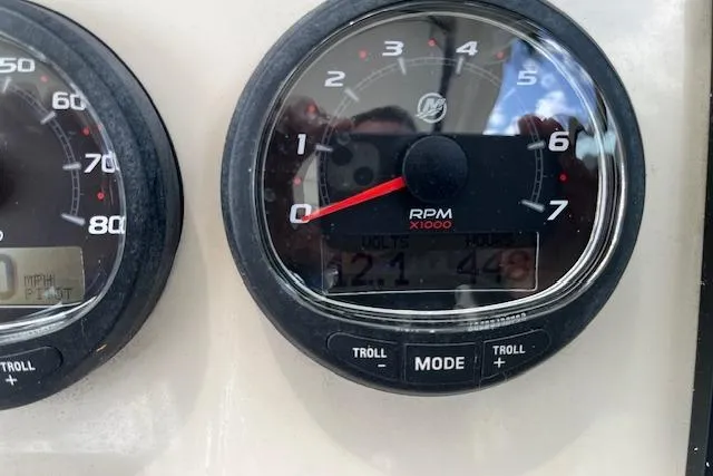 Slide: The Image of Close-up of 2015 Boston Whaler 270 Vantage boat tachometer displaying RPM and voltage. - 14