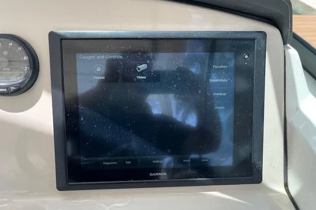 Slide: The Image of Garmin display on 2015 Boston Whaler 270 Vantage boat dashboard. - 19