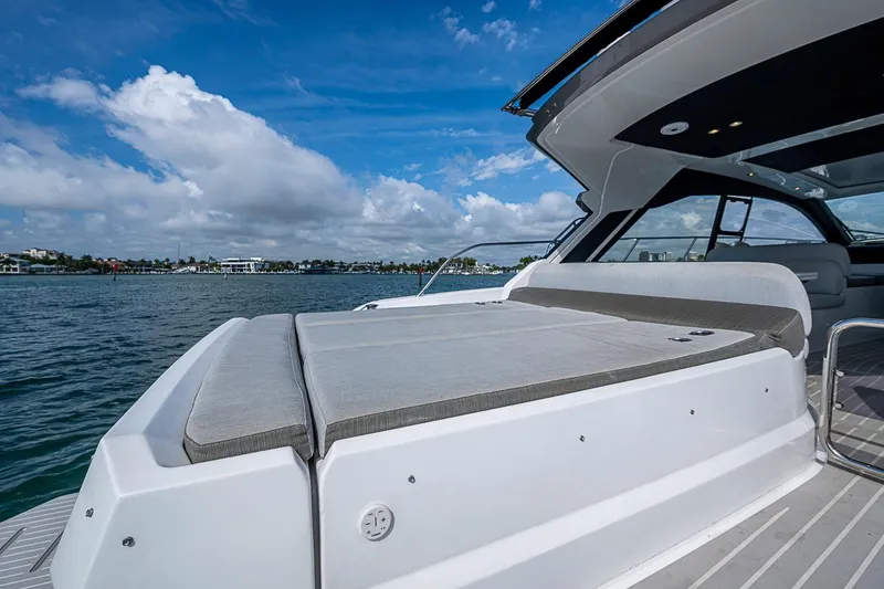 Slide: The Image of 2019 Azimut Atlantis 51 yacht with sun deck, ocean view, and blue sky. - 16