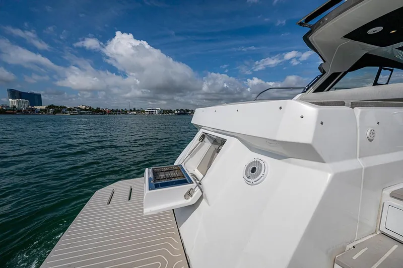 Slide: The Image of 2019 Azimut Atlantis 51 yacht on water, showcasing sleek design and luxury features. - 17