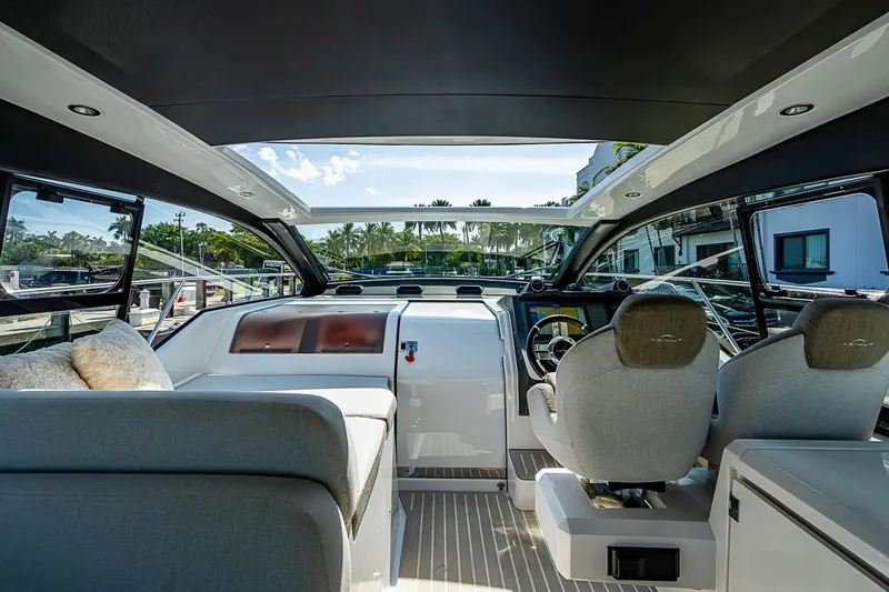 Slide: The Image of Interior view of 2019 Azimut Atlantis 51 yacht cockpit with modern seating and controls. - 32