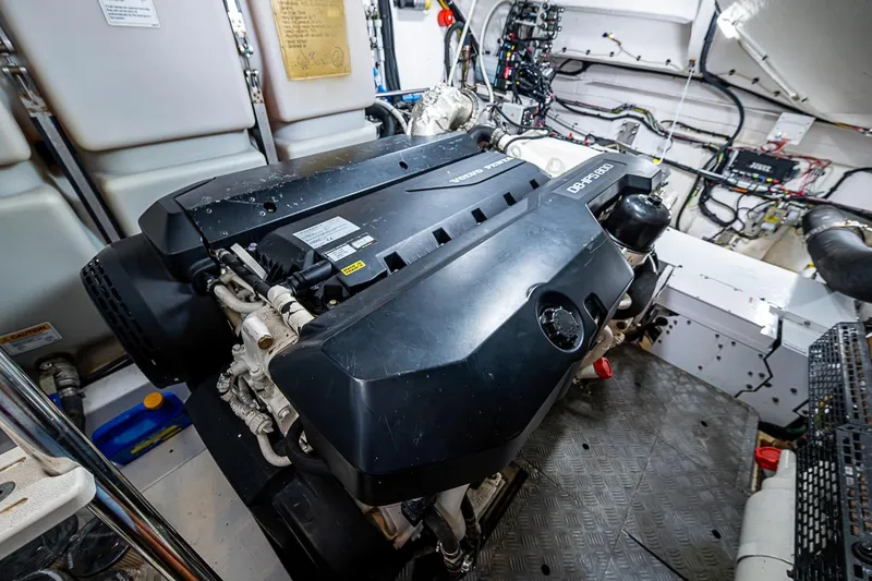 Slide: The Image of Engine room of 2019 Azimut Atlantis 51 yacht, featuring a Volvo Penta engine. - 58