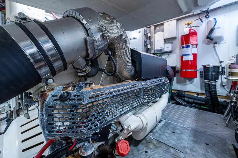 Slide: The Image of Engine room of 2019 Azimut Atlantis 51 yacht, featuring advanced machinery and safety equipment. - 63