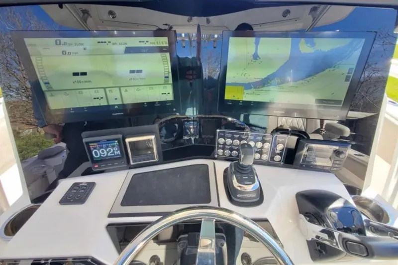 Slide: The Image of 2019 Sea Fox 328 Commander helm with dual Garmin displays and advanced controls. - 6