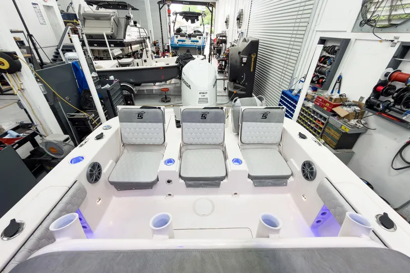 Slide: The Image of Interior of 2026 Carolina Skiff 24 Ultra Elite in storage. - 18