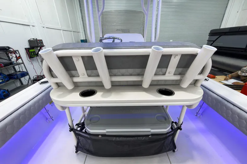 Slide: The Image of 2026 Carolina Skiff 24 Ultra Elite with rod holders and storage space. - 19