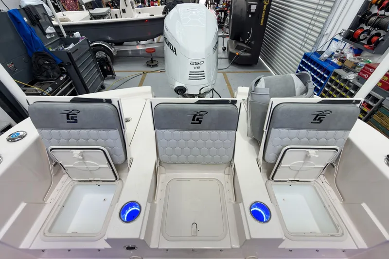Slide: The Image of Interior view of 2026 Carolina Skiff 24 Ultra Elite with Honda engine. - 21