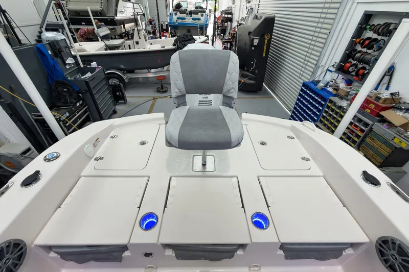 Slide: The Image of 2026 Carolina Skiff 24 Ultra Elite in workshop setting. - 22