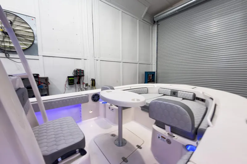 Slide: The Image of Interior of 2026 Carolina Skiff 24 Ultra Elite with seating area. - 28