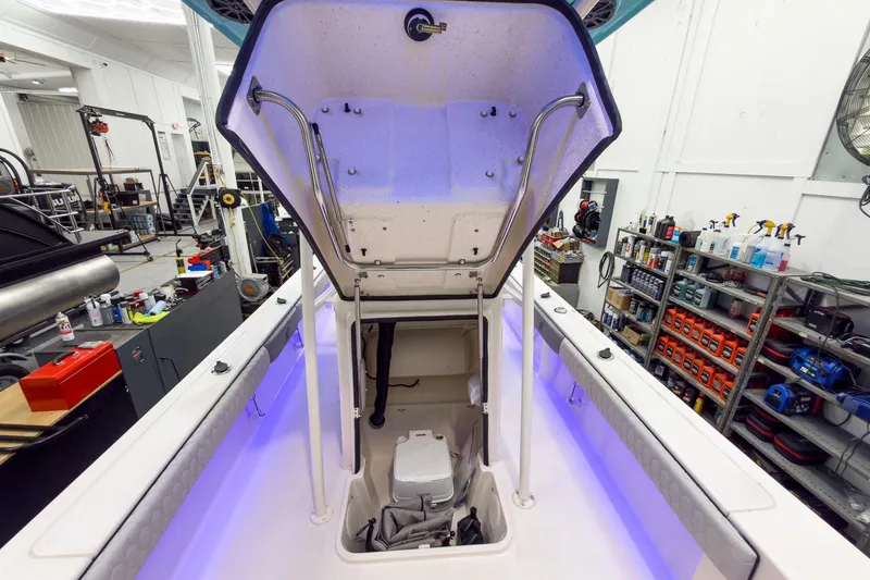 Slide: The Image of Interior view of Carolina Skiff 24 Ultra Elite 2026 in warehouse. - 38
