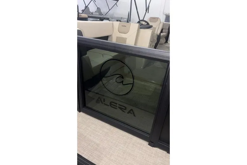 Slide: The Image of 2026 Alera A22Q boat interior with logo on glass panel. - 13