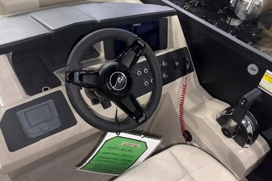 Slide: The Image of Steering console of 2026 Alera A22Q boat with modern controls and sleek design. - 5