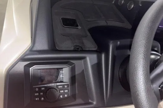 Slide: The Image of Dashboard of 2026 Alera Marine M23Q boat with control panel and steering wheel. - 11