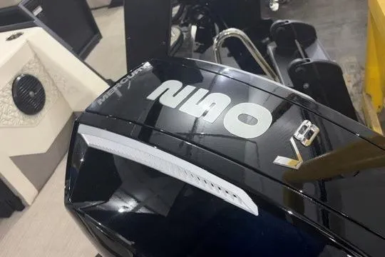 Slide: The Image of 2026 Alera Marine M23Q V8 engine, sleek black design in showroom setting. - 14