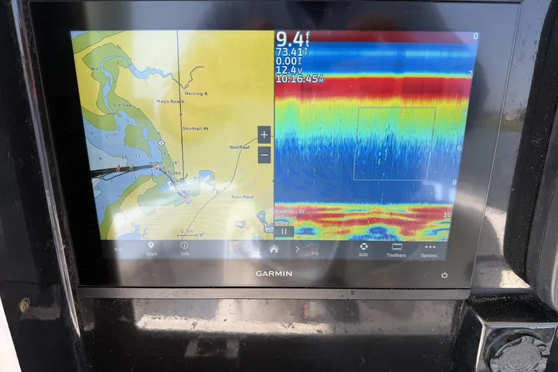 Slide: The Image of Garmin marine GPS and sonar display on a 2005 Regulator 32 Forward Seating boat. - 7