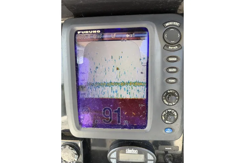 Slide: The Image of Furuno marine display on 2005 Regulator 32 Forward Seating boat dashboard. - 8