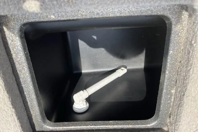 Slide: The Image of Storage compartment in a 1998 Tracker Targa 185 Sport boat. - 11