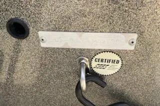 Slide: The Image of 1998 Tracker Targa 185 Sport certification plate with hook and label. - 19
