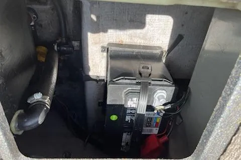 Slide: The Image of Battery compartment of a 1998 Tracker Targa 185 Sport boat, showing wiring and connections. - 4