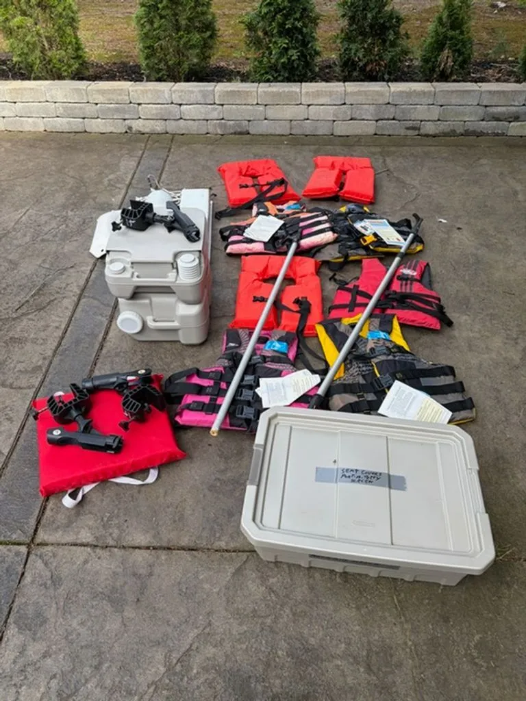 Slide: The Image of Boat accessories with life jackets and gear, Sun Tracker BB 2016. - 6