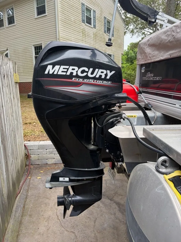 Slide: The Image of Mercury FourStroke outboard motor on Sun Tracker boat, model BB, year 2016. - 9