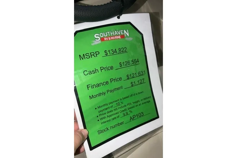 Slide: The Image of Green price tag for Alera M23L, 2026 model, showing MSRP, cash, and finance prices. - 1