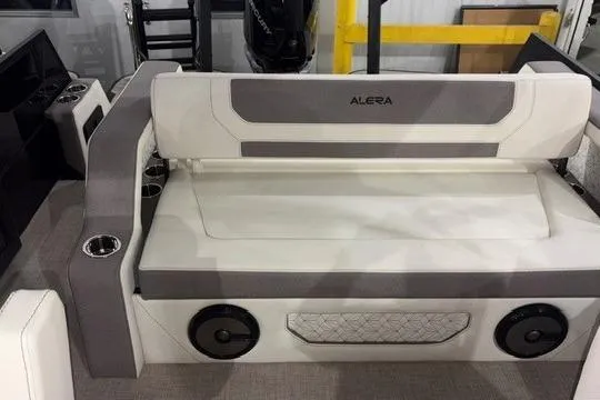 Slide: The Image of 2026 Alera M23L boat seating with integrated speakers and cup holders. - 10