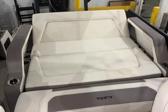 Slide: The Image of Luxurious seating area of 2026 Alera M23L boat with cup holders. - 4