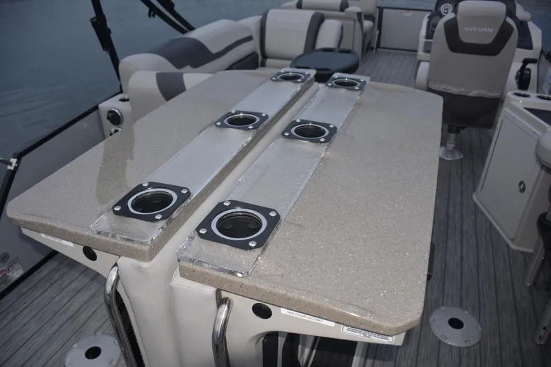 Slide: The Image of Manufacturer Provided Image: 2022 Sylvan L3 DLZ Bar boat interior with bar table and seating. - 13