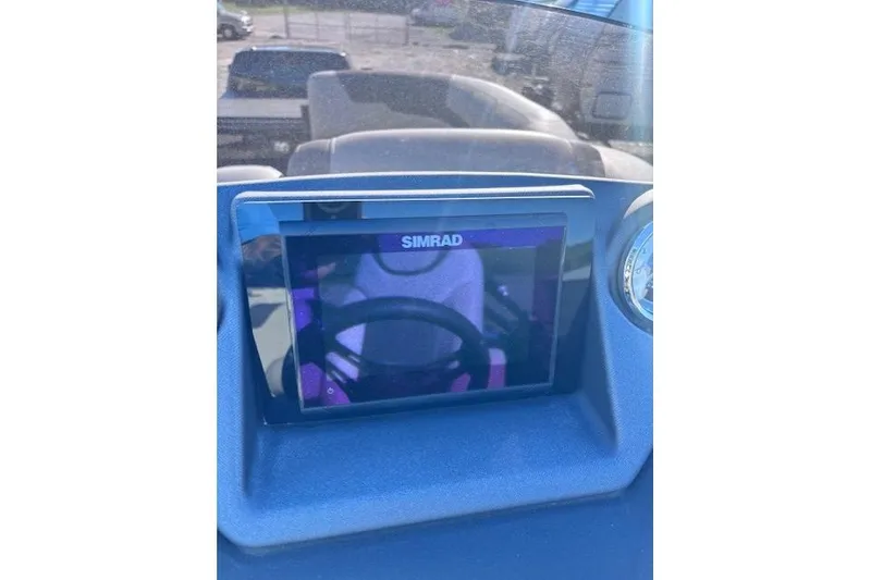 Slide: The Image of Simrad display on 2022 Sylvan L3 DLZ Bar boat dashboard. - 16