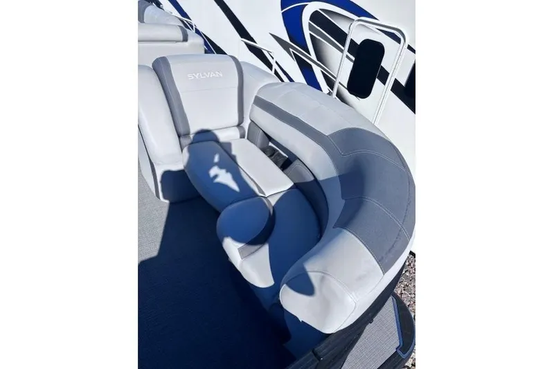 Slide: The Image of Luxurious seating on 2022 Sylvan L3 DLZ Bar pontoon boat, featuring sleek gray upholstery. - 8