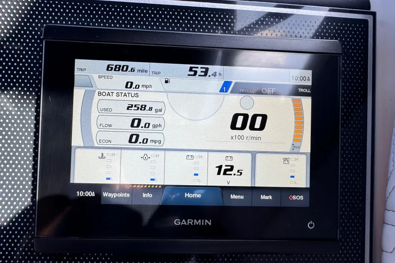 Slide: The Image of Garmin display on 2023 Hurricane SunDeck 2600 OB showing trip and boat status metrics. - 29