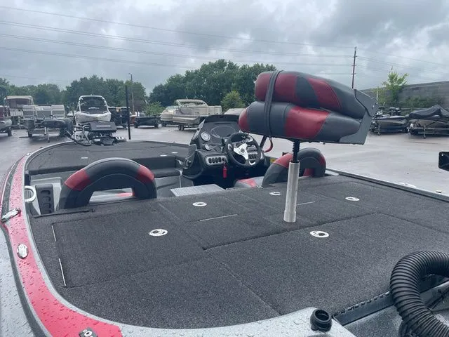 Slide: The Image of 2015 Nitro Z-8 boat with gray and red interior on parking lot. - 7
