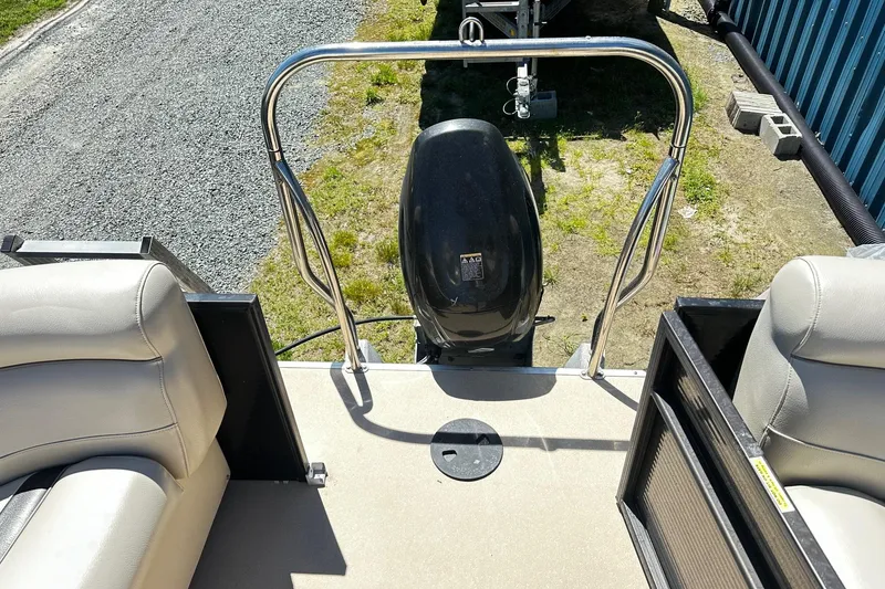 Slide: The Image of 2016 Godfrey Sweetwater 2286SB pontoon boat with outboard motor and beige seating. - 12