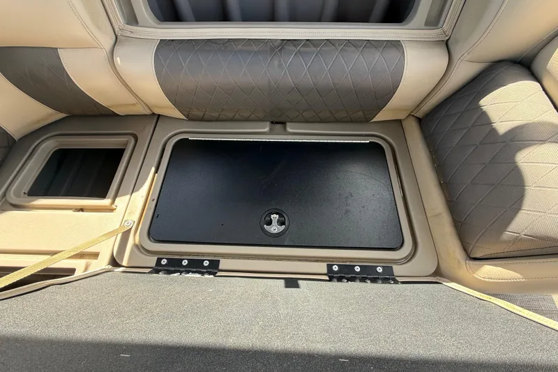 Slide: The Image of Interior storage compartment of 2021 Sun Tracker SportFish 22 DLX boat. - 32