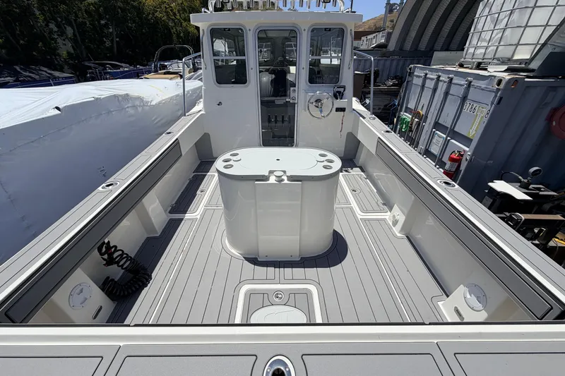 Slide: The Image of 2026 Defiance Admiral 270 EX boat deck with modern design and spacious layout. - 13