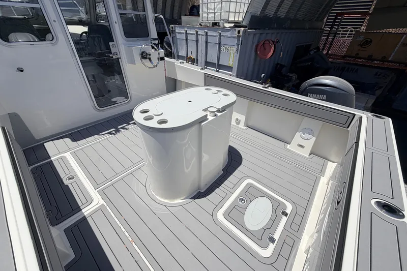 Slide: The Image of 2026 Defiance Admiral 270 EX boat deck with sleek design and modern features. - 19