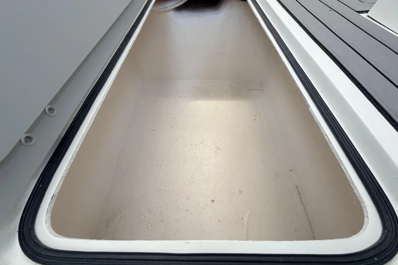 Slide: The Image of Storage compartment of 2026 Defiance Admiral 270 EX boat, featuring spacious interior design. - 35