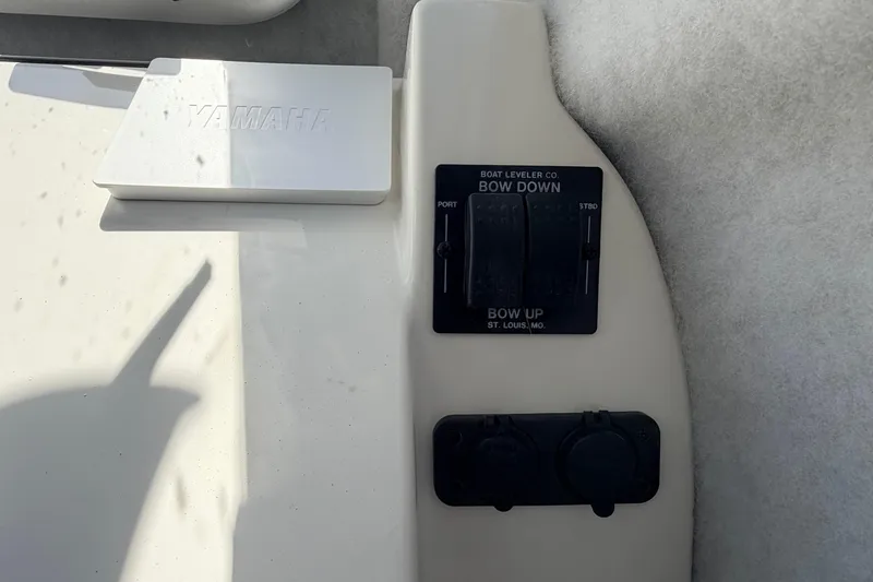 Slide: The Image of Control panel on a 2026 Defiance Admiral 270 EX boat with Yamaha cover. - 50
