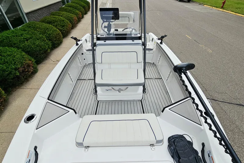Slide: The Image of 2020 Yamaha Boats 195 FSH Sport interior, featuring sleek seating and modern controls. - 15