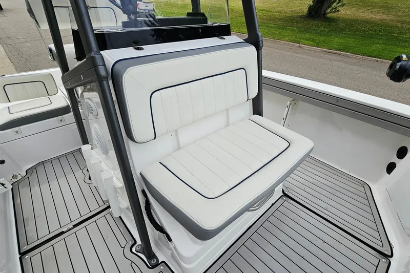 Slide: The Image of 2020 Yamaha Boats 195 FSH Sport interior with cushioned seating and sleek design. - 16